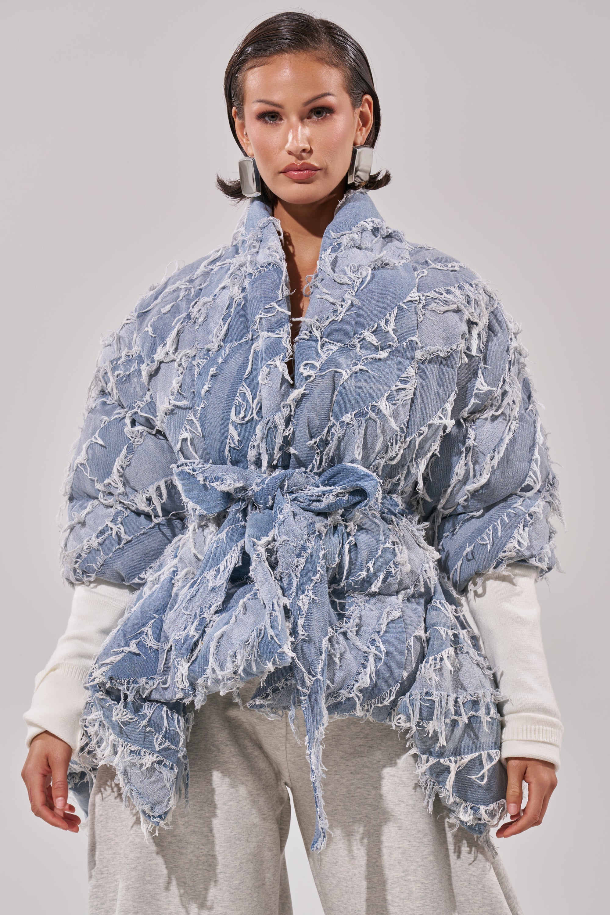 RIB SLEEVE PEPLUM PUFFER IN DENIM