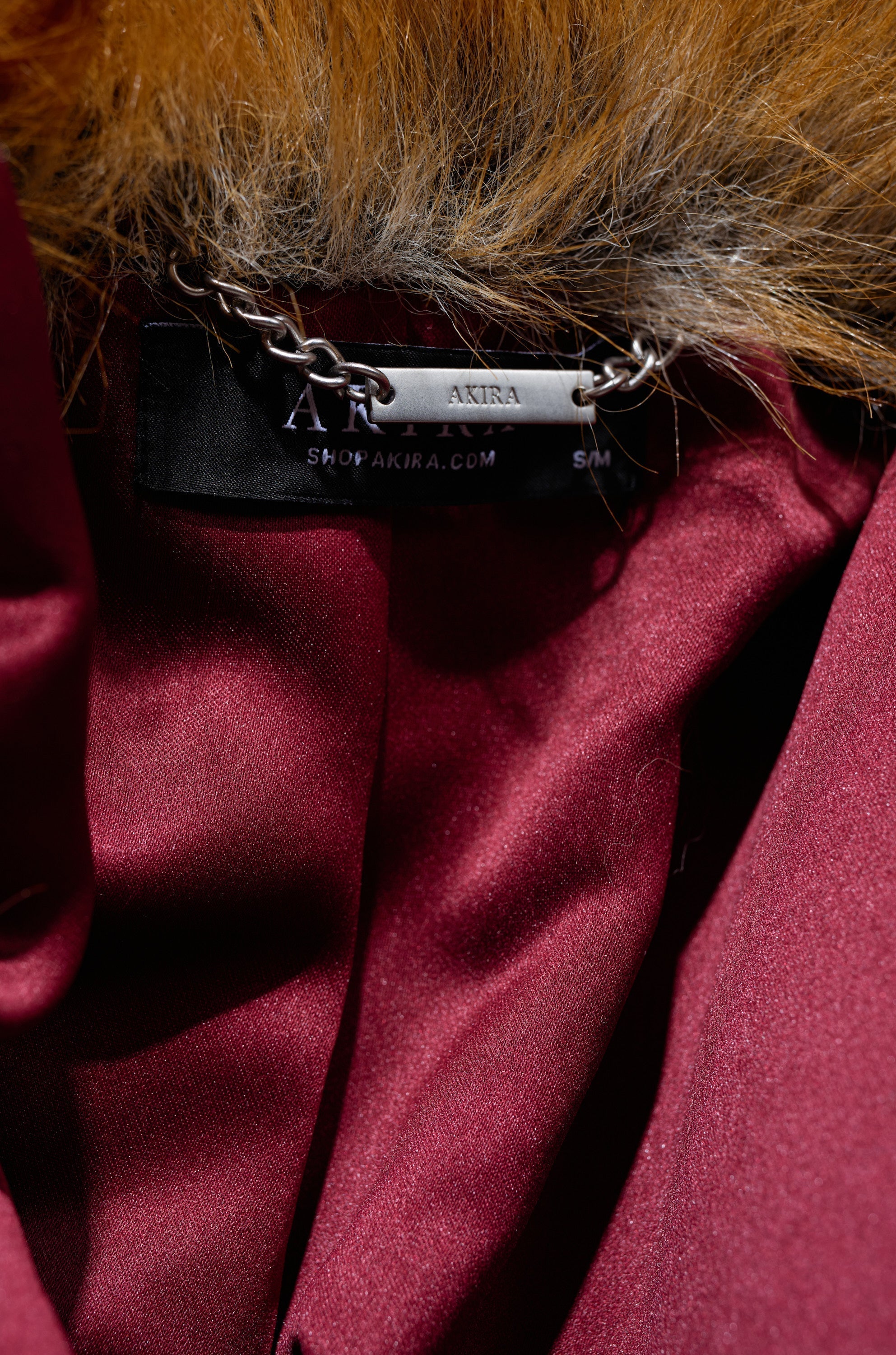 ALAIA STRIPED FAUX FUR
